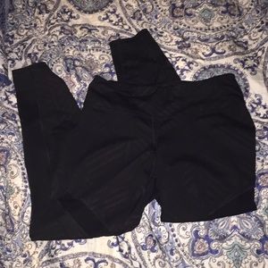 Black leggings with sheer cutouts